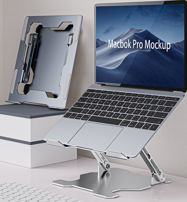 Silver laptop stand used with MacBook on desk.